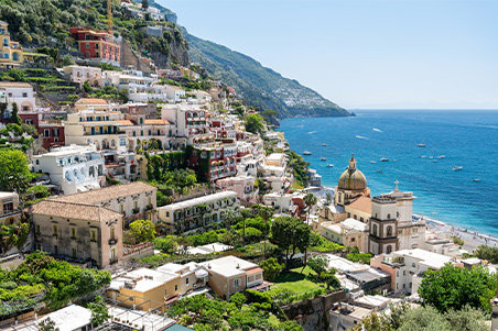 Beautiful city on a hill near water in Italy